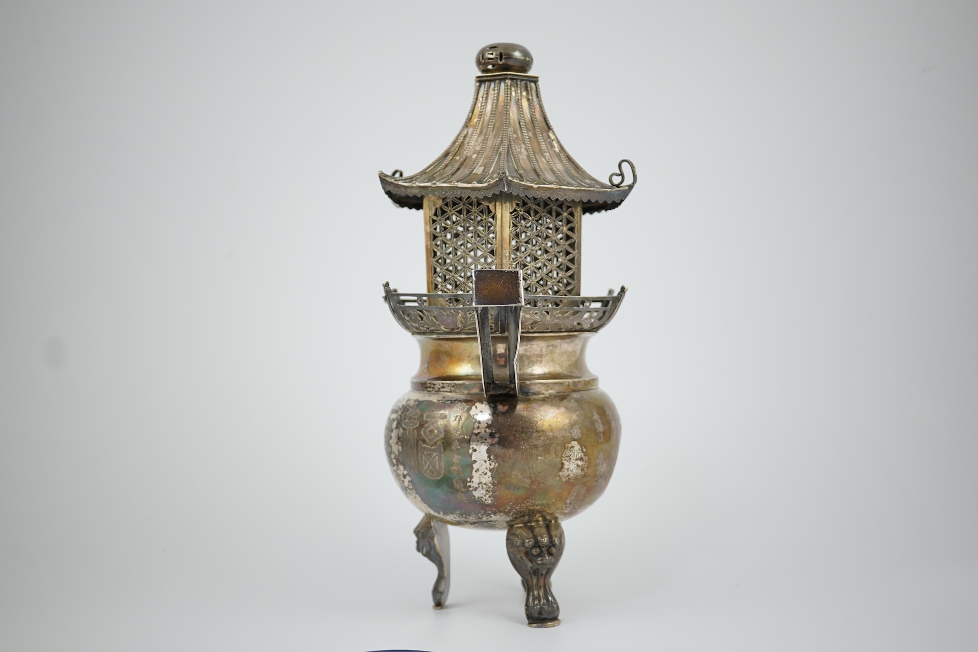 An unusual Chinese silver tripod censer with pagoda shaped cover, ding, early 20th century